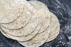 Stack Of Tortillas On A Black Surface